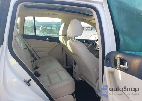 2011 Volkswagen Tiguan Sel z USA, uszkodzony, nr VIN WVGAV7AX3BW534888